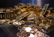 Giá vàng giảm dưới áp lực đồng USD mạnh lên, quỹ SPDR Gold Trust bán ròng